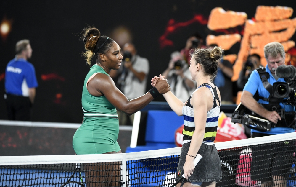 Simona Halep (R) of Romania and Serena Williams (L) of USA congratulate each other after Australian Open 2019 Women's Singles match in Melbourne, Australia on January 21, 2019. Recep Sakar - Anadolu