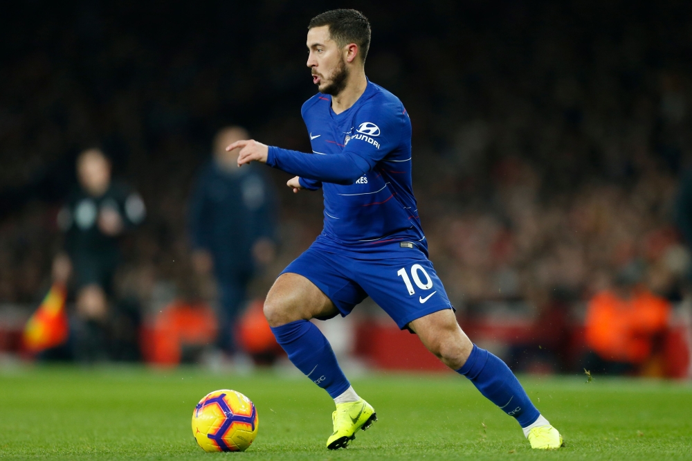 Chelsea's Belgian midfielder Eden Hazard runs with the ball during the English Premier League football match between Arsenal and Chelsea at the Emirates Stadium in London on January 19, 2019. AFP / IKIMAGES / Ian KINGTON /