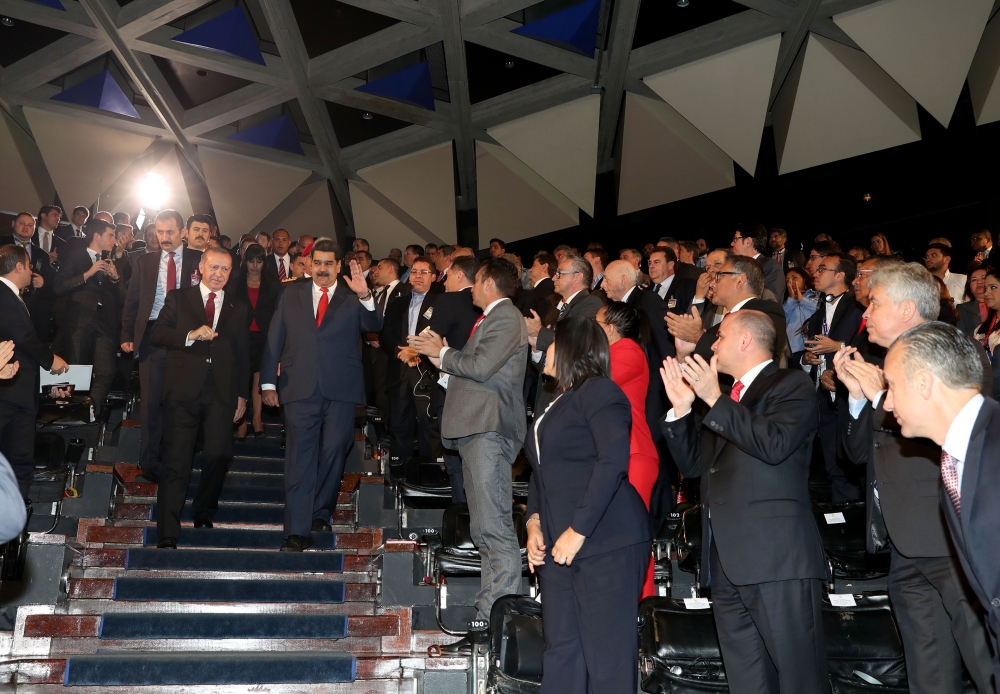 Recep Tayyip Erdogan and Nicolas Maduro arrive to attend the Venezuela-Turkey Business Forum in Caracas, Venezuela on December 03, 2018. Cem Öksüz/Anadolu Agency