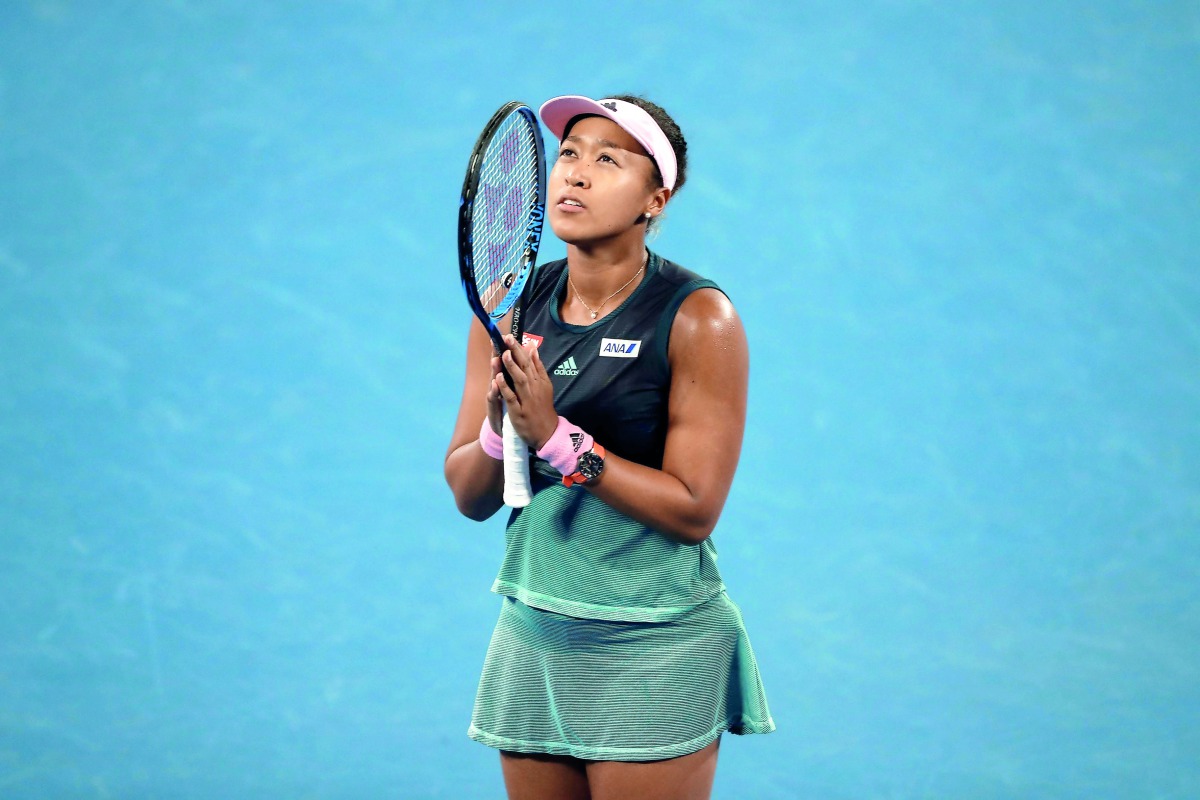 Japan's Naomi Osaka celebrates after victory over Czech Republic's Karolina Pliskova during their women's singles semi-final match on day 11 of the Australian Open tennis tournament in Melbourne on January 24, 2019. AFP / David Gray 