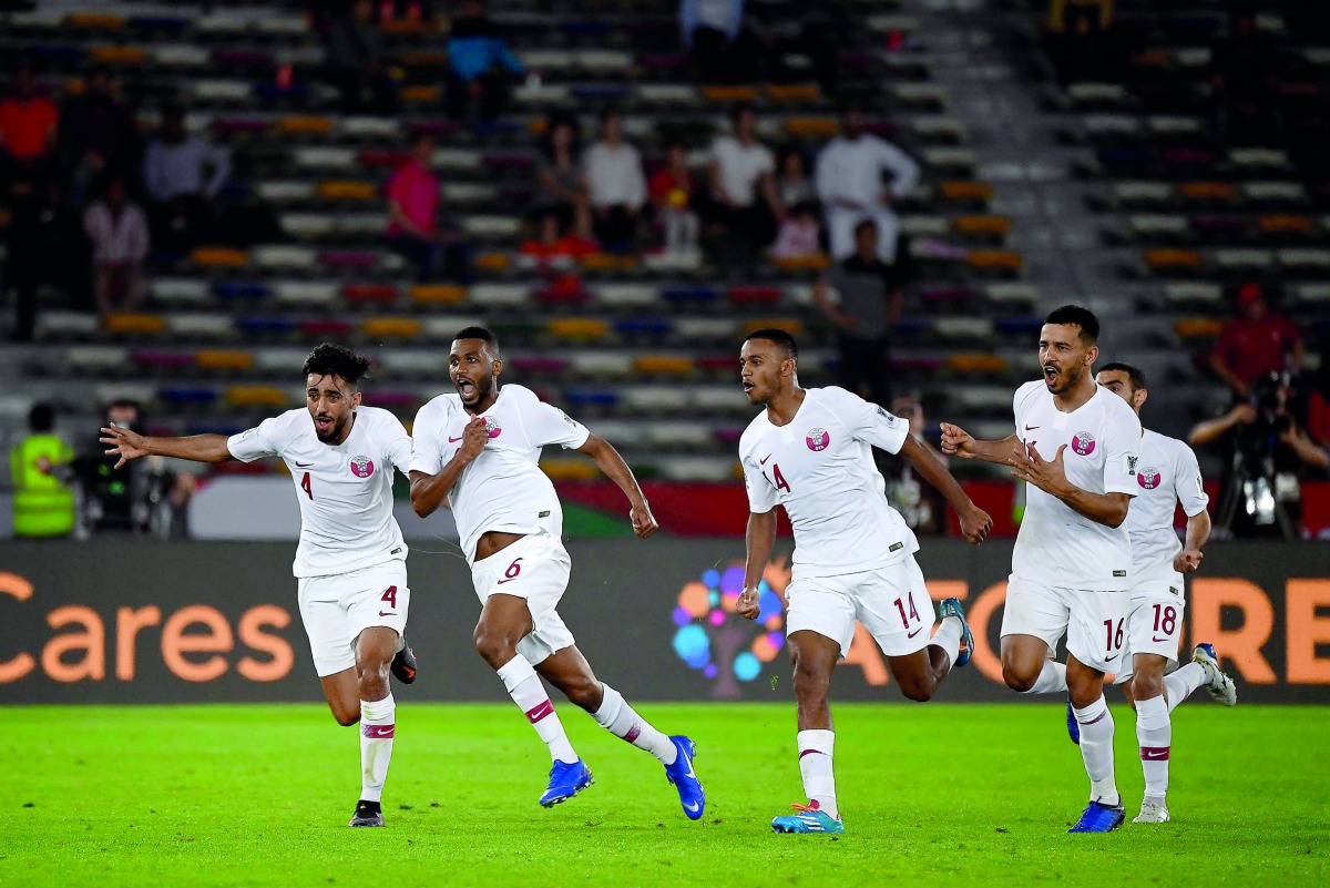 Qatari midfielder Abdelaziz Hatem (second left), celebrates after scoring the winning goal during the 2019 AFC Asian Cup quarter-final football match against South Korea at Zayed Sports City in Abu Dhabi, UAE, yesterday. Qatar won 1-0 to reach the semi-fi