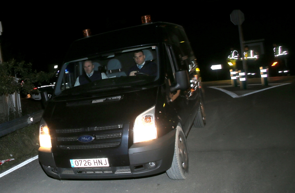 Funeral workers drive a van carrying the body of Julen as they leave the area after the body of the Spanish two-year-old boy who fell into a deep well thirteen days ago when the family was taking a stroll through a private estate was found, in Totalan, so