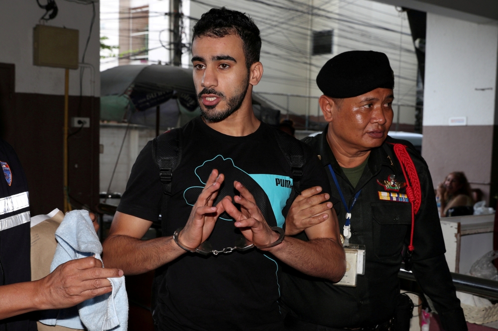File photo of Hakeem AlAraibi, a former member of Bahrain's national soccer team who holds a refugee status in Australia arrives at court after he was arrested last month on arrival at a Bangkok airport based on an Interpol notice issued at Bahrain's requ