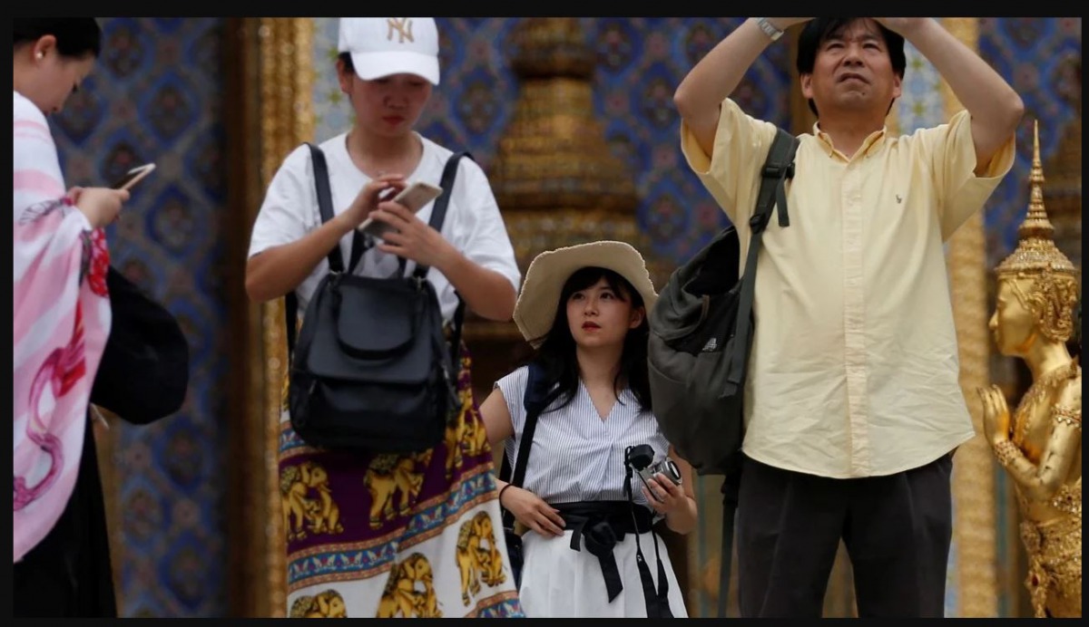 File photo of Chinese tourists at Wat Phra Kaew in Bangkok, Thailand. Source: Reuters
