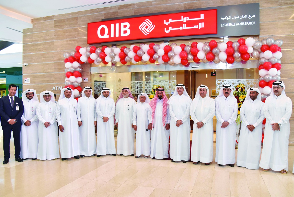 Sheikh Dr Khalid bin Thani bin Abdullah Al Thani, Chairman and Managing Director of QIIB, with Board members, and senior QIIB executives, and a number of senior shareholders and customers of the bank at the Bank’s branch inauguration at Ezdan Mall in Al W