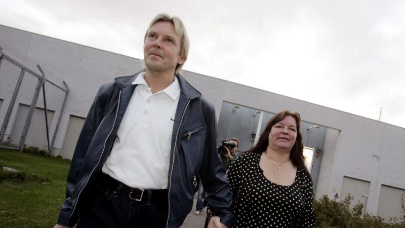Finland's former Olympic ski jumping champion Matti Nykanen (L) walks out with his friend Mervi Tapola after being released from Kylmakoski prison in Finland in this September 21, 2005 file photo. REUTERS/Jussi Nukari/Lehtikuva/Files