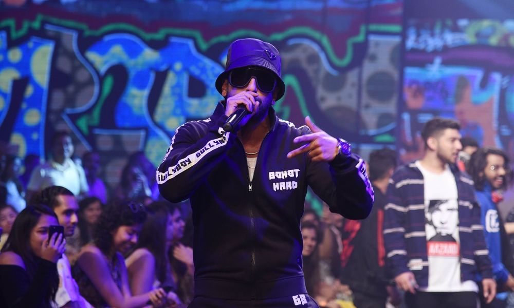 Indian Bollywood actor Ranveer Singh showcases a creation of the 