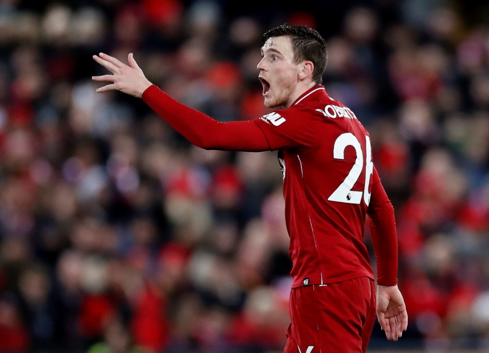 Liverpool's Andrew Robertson gestures during the match. (Action Images via Reuters/Carl Recine)