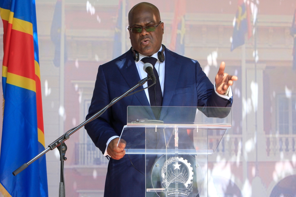 President of the Democratic Republic of the Congo Felix Tshisekedi gestures as he delivers a speech on the sidelines of his first visit as new DRCongo President in Luanda, northwestern Angola, on February 5, 2019. / AFP 