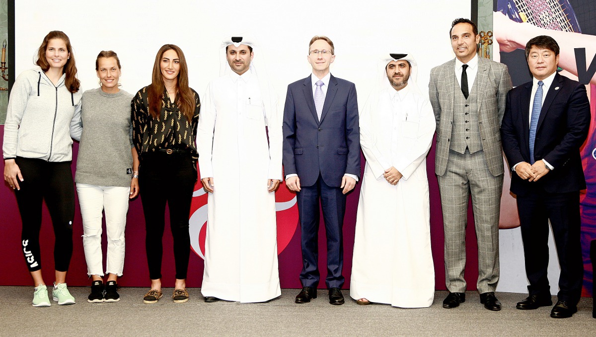 FROM LEFT: Julia Gorges of Germany, Barbora Strycova of Czech Republic, Oman’s Fatma Al Nabhani, Tournament Director Saad Saleh Al Mohannadi, Managing Director of Total E&P Golfe and Group Representative Laurent Wolffsheim, Qatar Tennis Federation (QTF) S