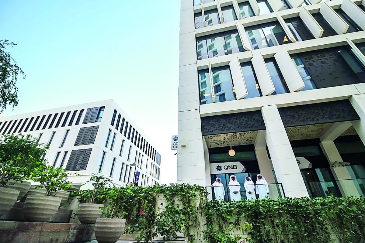 QNB's Acting Group Chief Executive Officer and other top executives of the bank during their visit to  QNB’s branch in Msheireb Downtown Doha.
