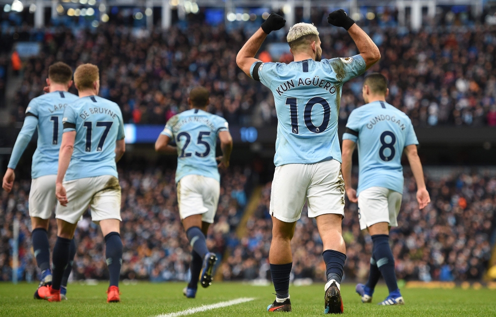 Manchester City's Argentinian striker Sergio Aguero celebrates scoring his team's third goal during the English Premier League football match between Manchester City and Burnley at the Etihad Stadium in Manchester, north west England, on February 10, 2019