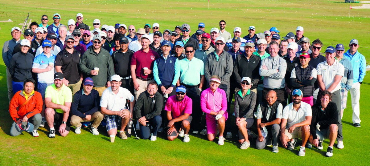 The golfers, who took part in the National Sport Day event at the Education City Golf Club on Tuesday, pose for a group picture.