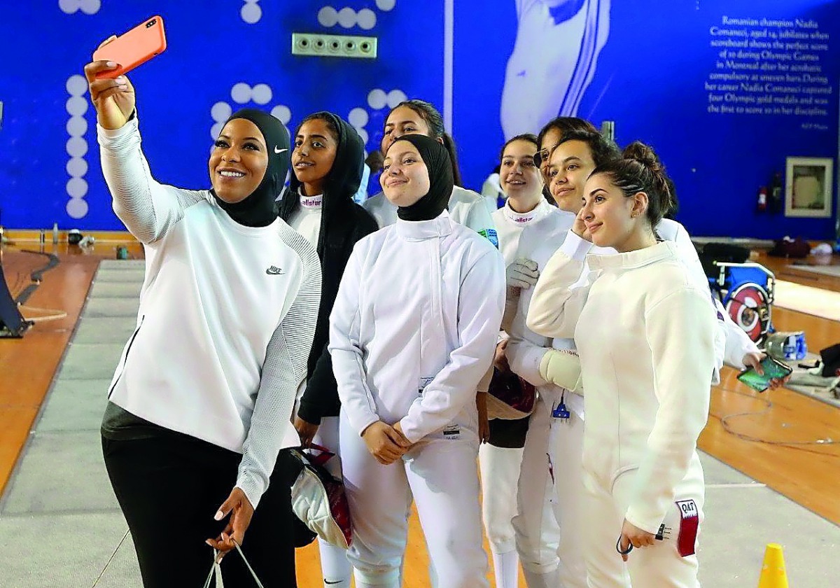 Ibtihaj Muhammed with the student athletes at Aspire Academy.
