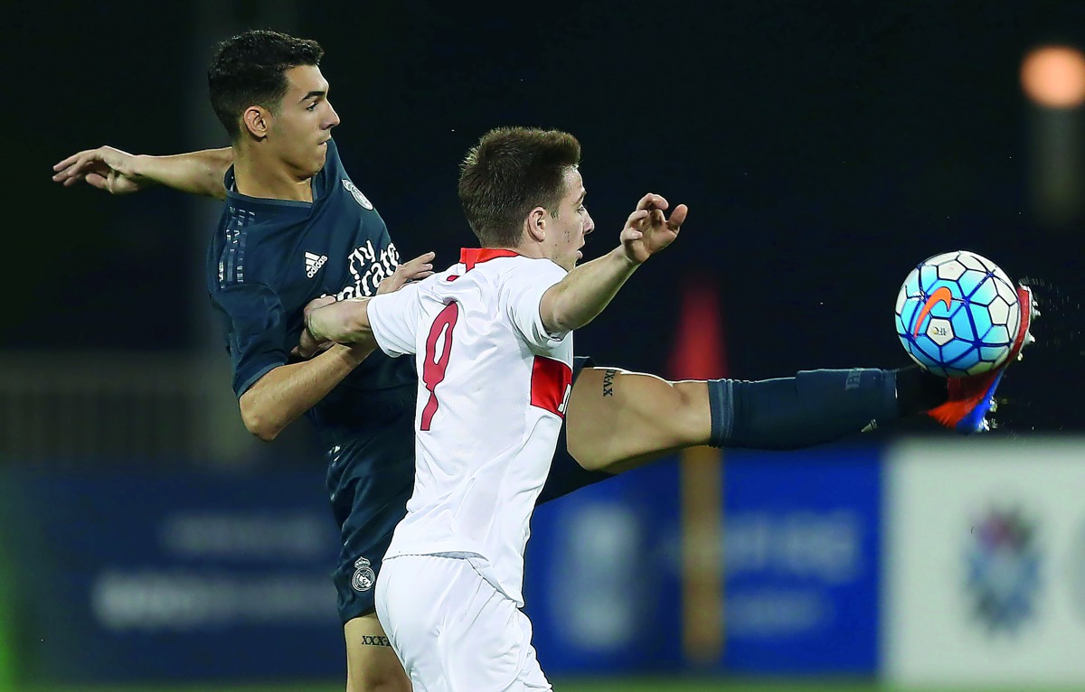 Real Madrid and Spartak Moscow players vie for the ball possession during their Al Kass Cup fifth place play-off match played at the Aspire Zone in Doha, yesterday. Real Madrid won 4-2. 
