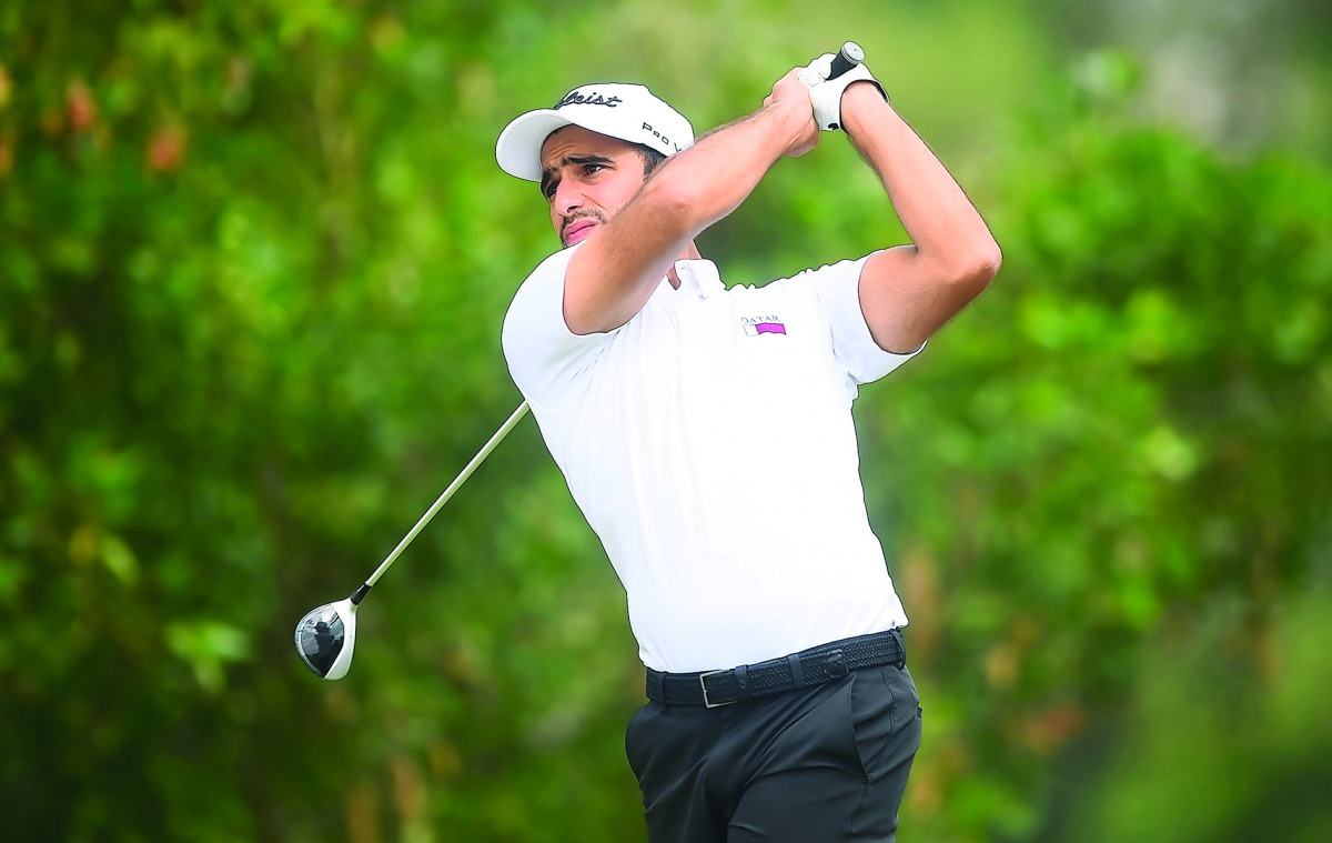 Qatar’s Jaham Jassim Al Kuwari in action during the Qatar Open Amateur Championship at the Doha Golf Club yesterday.