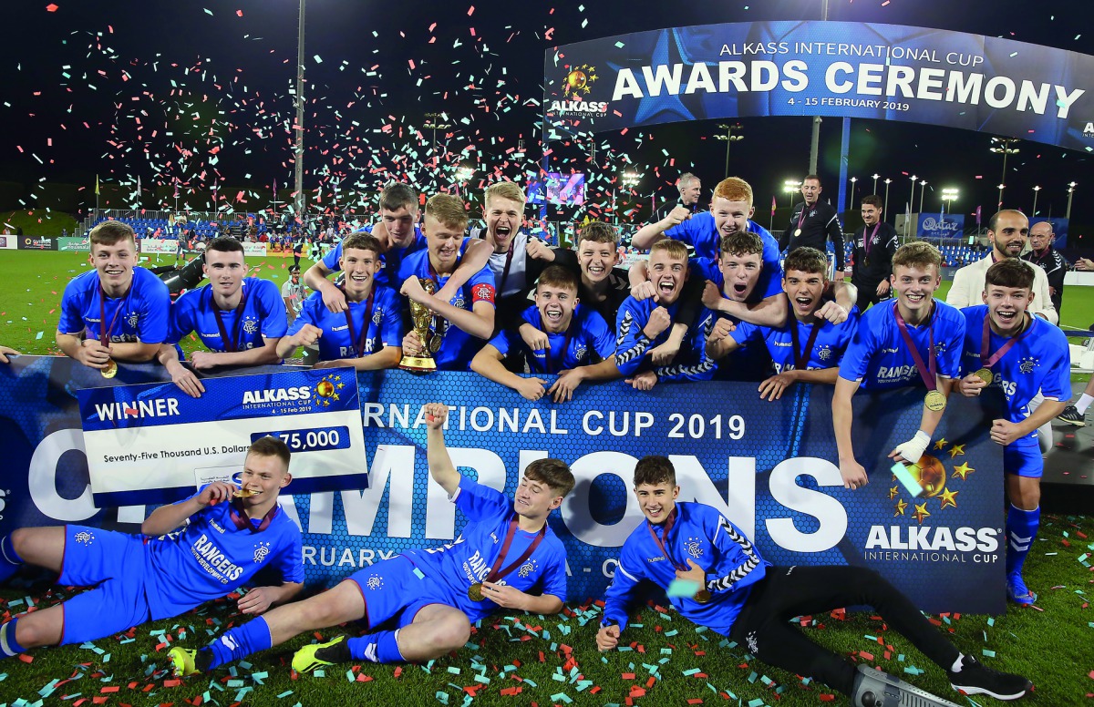 Rangers players and officials celebrate after defeating Roma in the final of the Al Kass Cup at Aspire Zone in Doha, yesterday.