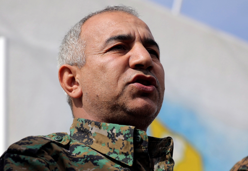 Jiya Furat, commander of the assault on the last jihadist enclave in eastern Syria, talks during a press conference near Baghouz, Deir Al Zor province, Syria February 16, 2019. REUTERS/Rodi Said