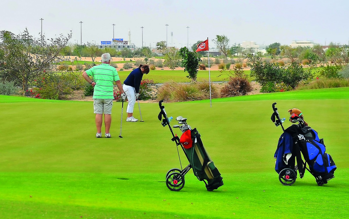 Golfers in action at the practice range of Education City Golf Club during the media familiarisation trip, yesterday. Baher Amin/The Peninsula