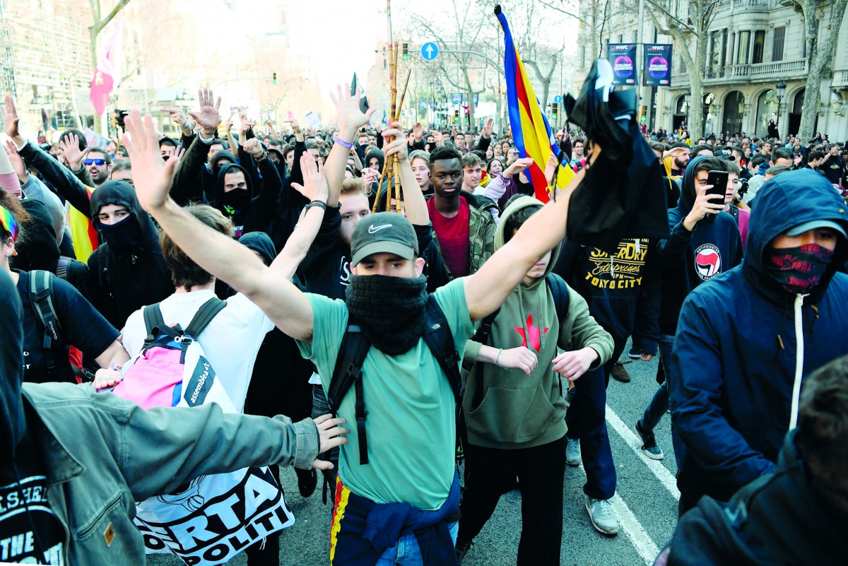 People protest during a strike day in Barcelona against the trial of former Catalan separatist leaders held in Madrid, on February 21, 2019. AFP / Lluis Gene