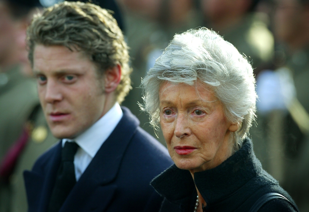 File photo of Marella Agnelli and her grandson Lapo Elkann look on as the coffin of her husband Gianni Agnelli is carried into the Turin Cathedral January 26, 2003. REUTERS/Dylan Martinez/File Photo