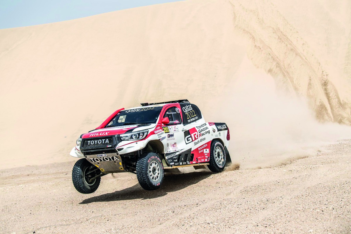 Qatar’s Nasser Saleh Al Attiyah and his French navigator  Matthieu Baumel driving their Toyota Hilux during the second selective section of the Manateq Qatar Cross-Country Rally, yesterday.
