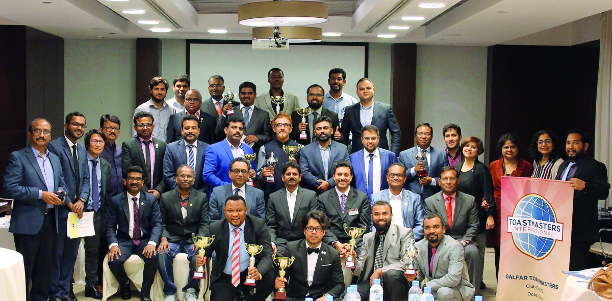 The Galfar Toastmasters Club members pose for a group photo.

