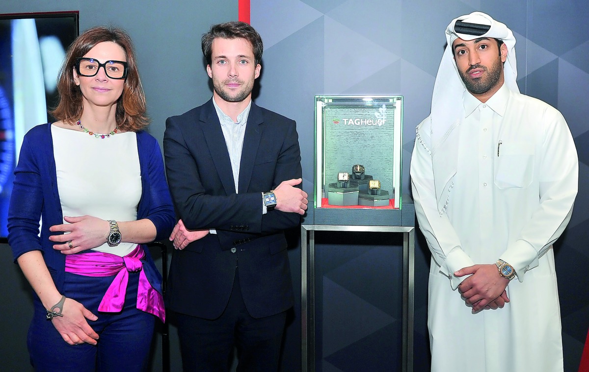 Catherine Eberle Devaux (left), Heritage Director; Paul Boissonnet, Brand Director of TAG Heuer; and Nasr Al Majed, Al Majed Jewellery Business Development Director, during the Doha Jewellery and Watches Exhibition held at DECC. pic: Baher Amin / The Peni