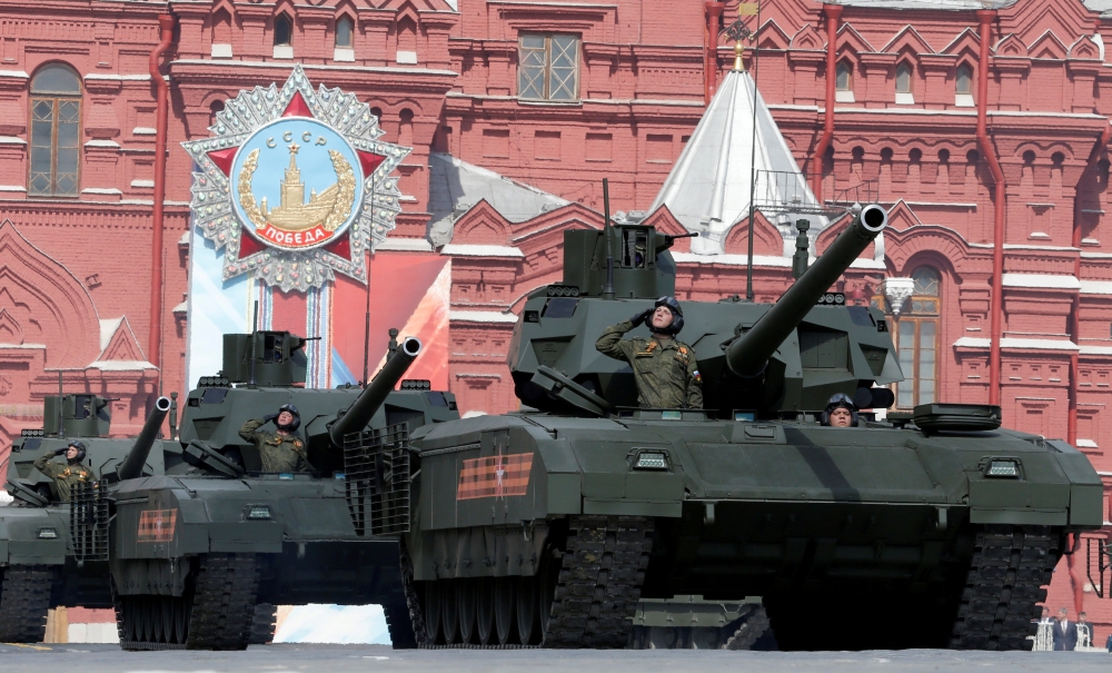 Russian T-14 tanks with the Armata Universal Combat Platforms drive along Red Square during a rehearsal for the Victory Day parade, marking the 71st anniversary of the victory over Nazi Germany in World War Two, in central Moscow, Russia, May 7, 2016. Reu