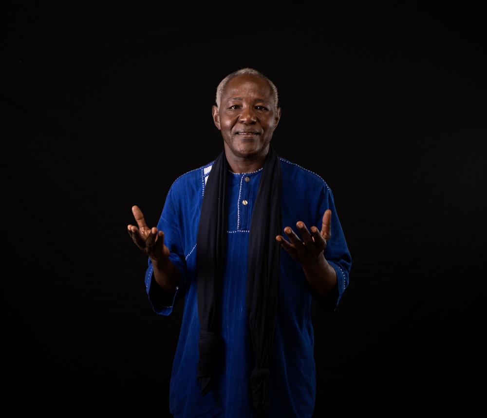 Burkina Faso film director Abdoulaye Dao poses for a portrait in Ouagadougou, on February 25, 2019 during the 