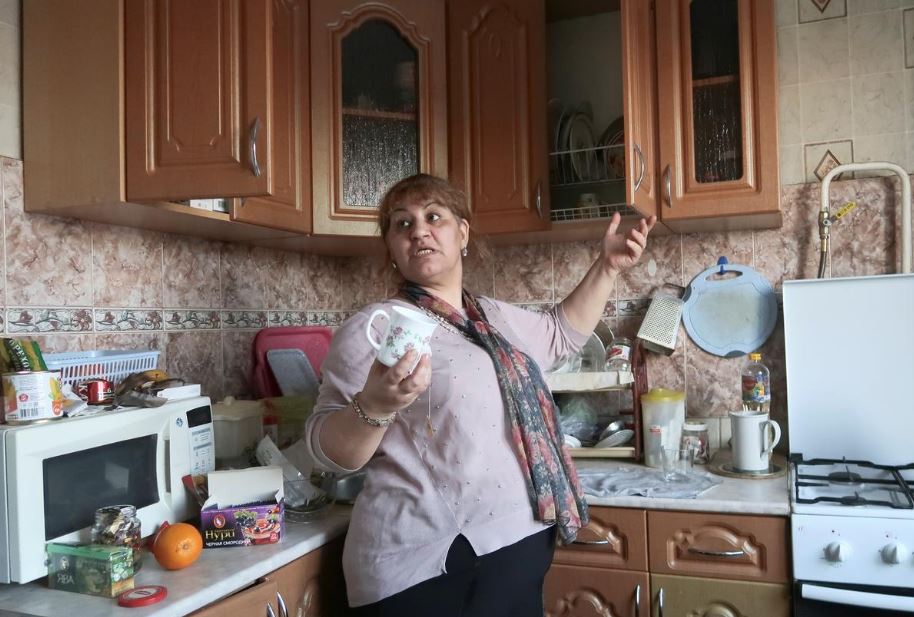 Syrian refugee Safaa Al-Kurdi speaks during an interview in an apartment in the village of Mamontovo near Moscow, Russia February 19, 2019. Picture taken February 19, 2019. REUTERS/Maria Vasilyeva
