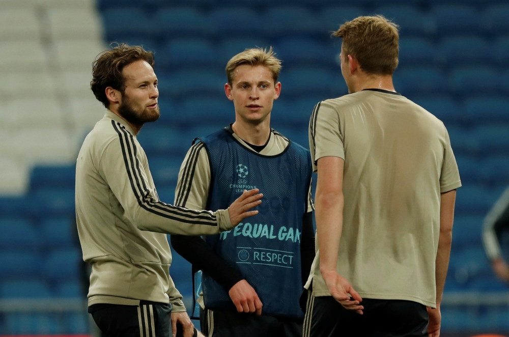 Ajax Amsterdam's Frenkie de Jong and Daley Blind during training REUTERS/Susana Vera
