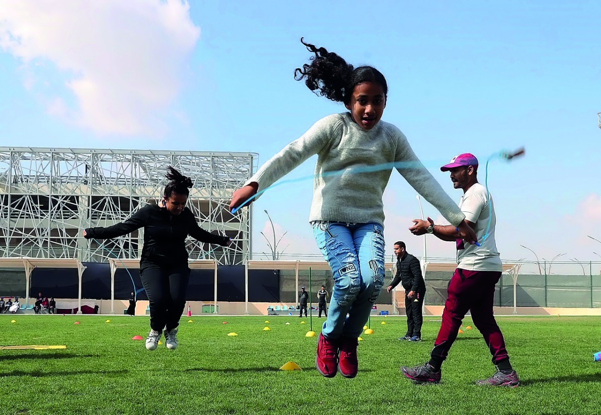 Young girls taking part in sport and physical activities.