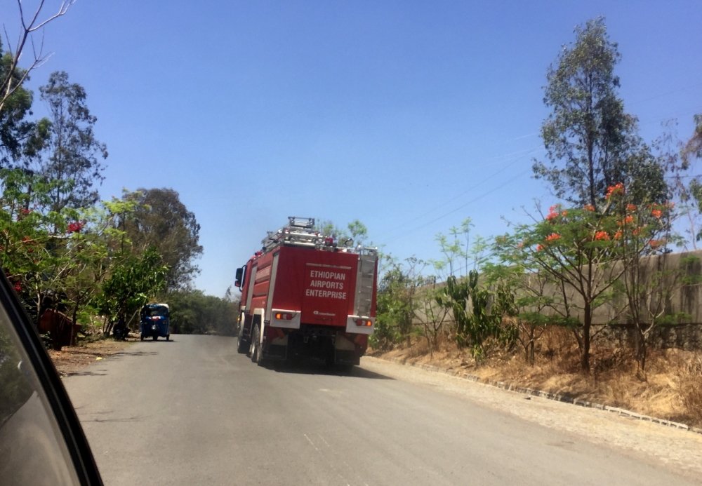 An Ethiopian Airports Enterprise fire engine drives to the scene of the Flight ET 302 plane crash, near the town of Bishoftu, southeast of Addis Ababa, Ethiopia March 10, 2019. (REUTERS/Tiksa Negeri)
