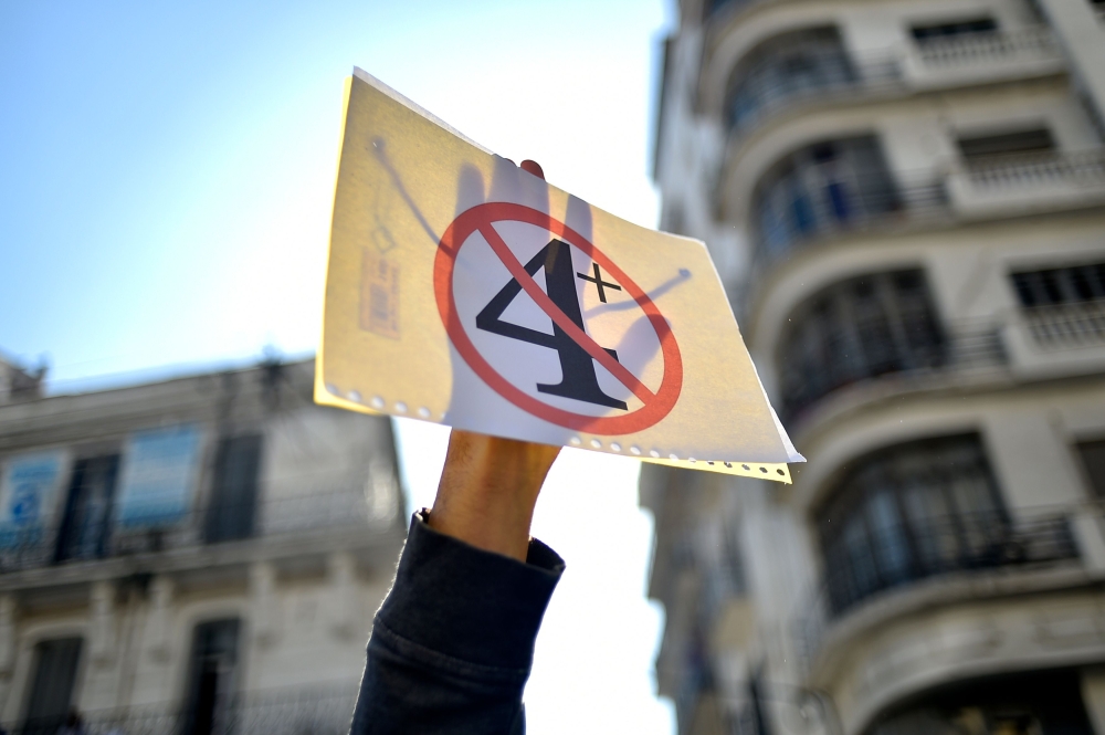 Algerian students demonstrate in the centre of the capital Algiers on March 12, 2019, one day after President Abdelaziz Bouteflika announced his withdrawal from a bid to win another term in office and postponed an April 18 election, following weeks of pro