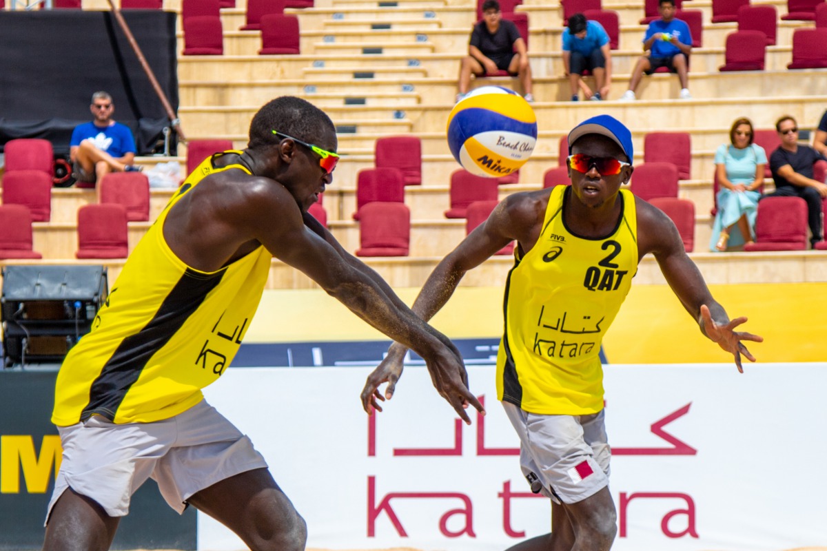 Qatar’s Ahmed Tijan and Cherif Younousse in action during the first round of the main draw of the FIVB Beach Volleyball World Tour Katara Cup 2019 at the Katara Cultural Village Amphitheatre yesterday.
