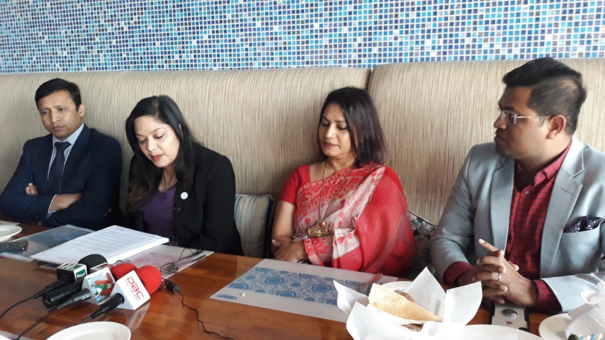 Officials of Bangladesh Forum Qatar addressing the press conference.