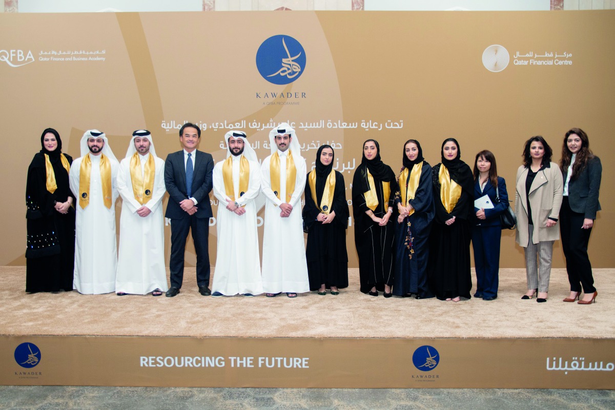 QFBA Kawader interns posing for a group photo with the officials.