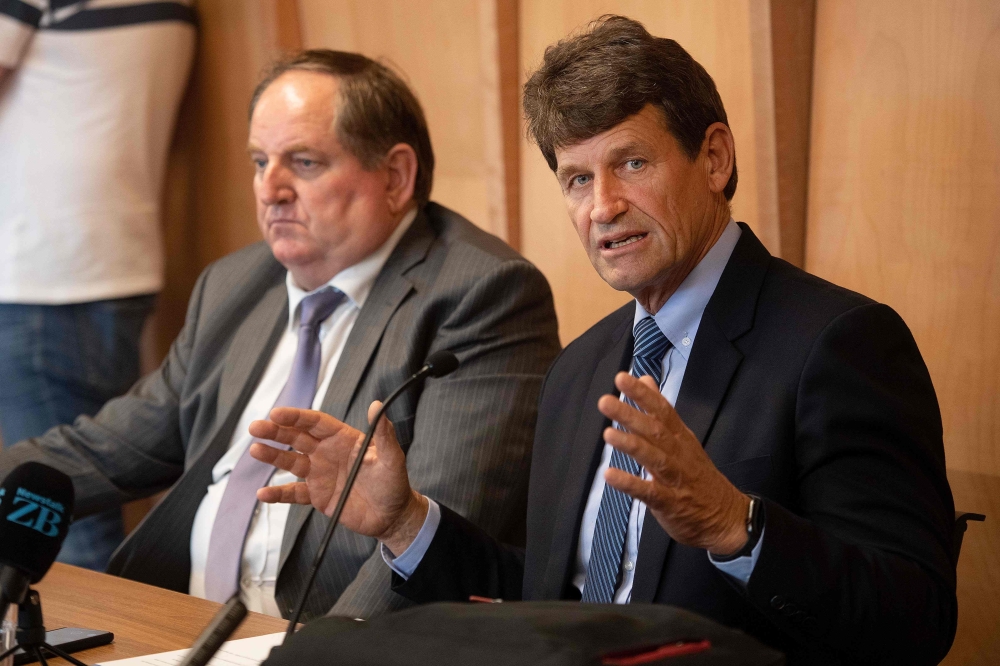 Gun City store owner David Tipple (R) with his public relation advisor David Linch speak to the media during a press conference at the Piano Event Centre in Christchurch on March 18th, 2019, after 50 worshippers were killed last week in two mosque attacks