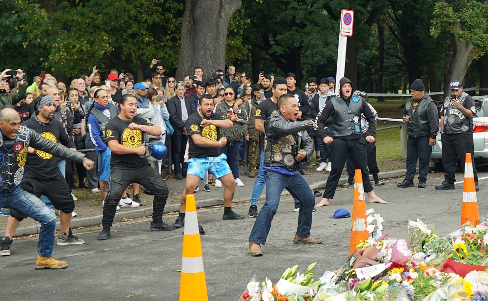 Members of a New Zealand biker gang perform the Haka to honour the victims of the mosque shootings in Christchurch, New Zealand, March 17, 2019. Picture taken March 17, 2019. REUTERS/Joseph Campbell