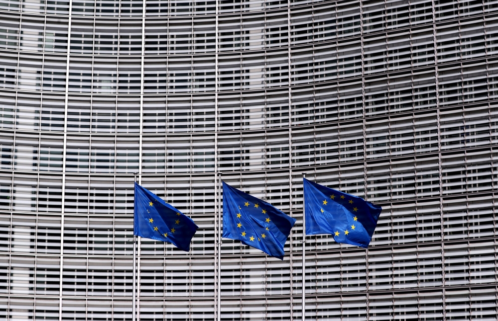 FILE PHOTO: European Union flags fly outside the European Commission headquarters in Brussels, Belgium March 19, 2019 REUTERS/Yves Herman/File Photo