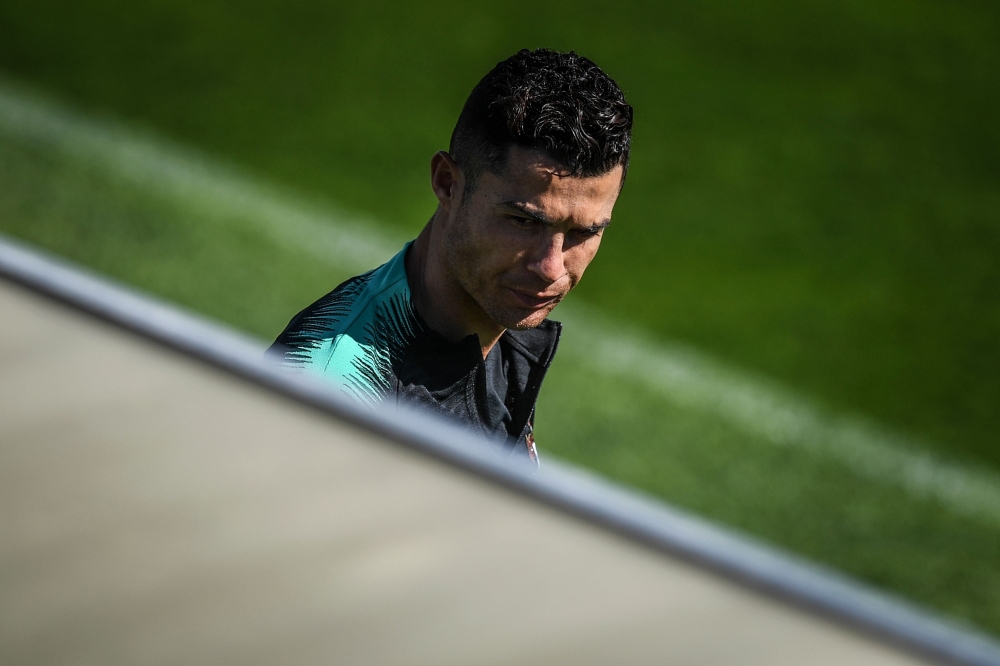 Portugal's forward Cristiano Ronaldo arrives for a training session at 