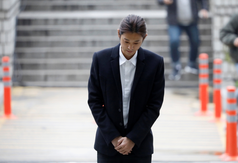 South Korean singer Jung Joon-young arrives at a court to attend a hearing for reviewing the prosecution's detention warrant at the Seoul Central District Court in Seoul, South Korea, March 21, 2019. Reuters/Kim Hong-Ji