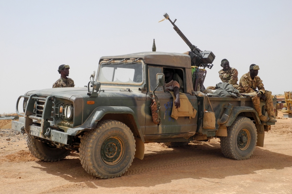Members of the Malian Army (Fama), patrol in Anderamboukane, in Menaka region, on March 22, 2019. / AFP / Agnes COUDURIER