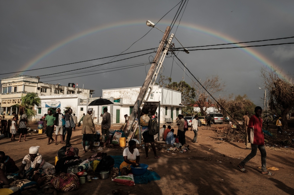 A rainbow appears in the sky in Buzi, Mozambique, on March 23, 2019, after the area was hit by the Cyclone Idai. The death toll in Mozambique on March 23, 2019 climbed to 417 after a cyclone pummelled swathes of the southern African country, flooding thou