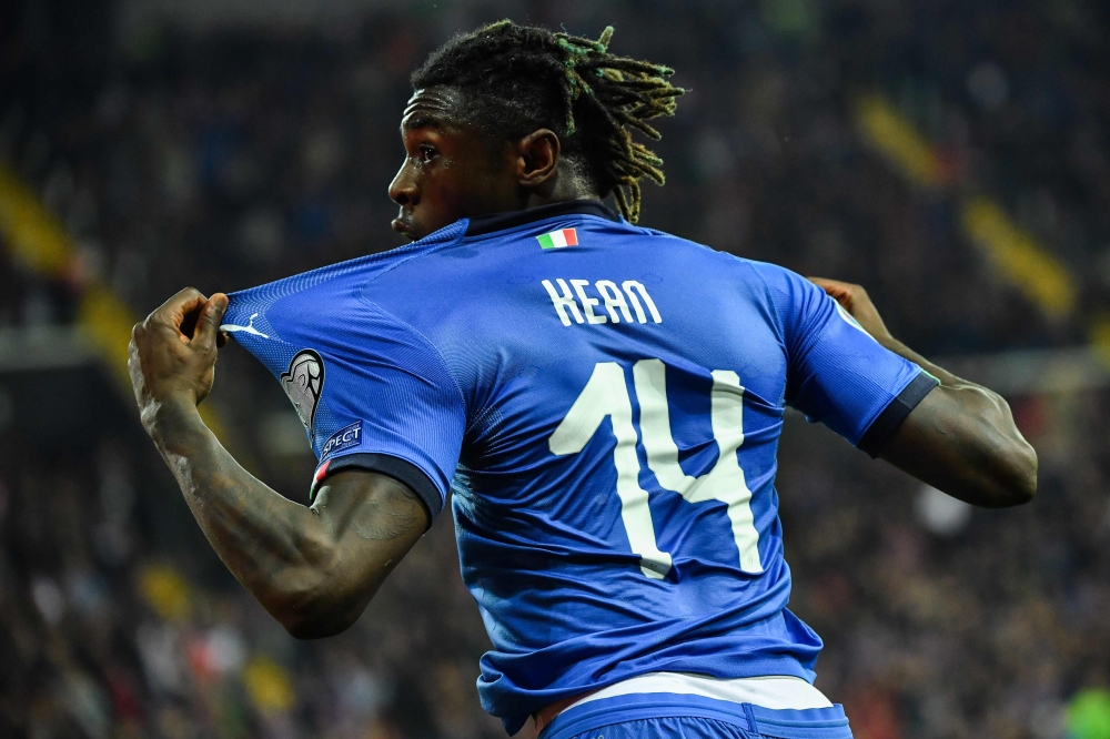 Italy's forward Moise Kean celebrates after scoring during the Euro 2020 Group J qualifying football match between Italy and Finland on March 23, 2019 at the Friuli stadium in Udine. / AFP / Andreas SOLARO