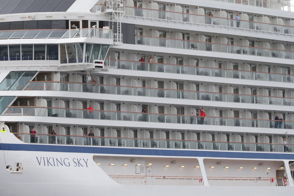 The cruise ship Viking Sky, that ran into trouble in stormy seas off Norway, reaches the port of Molde under its own steam on March 24, 2019.   AFP 