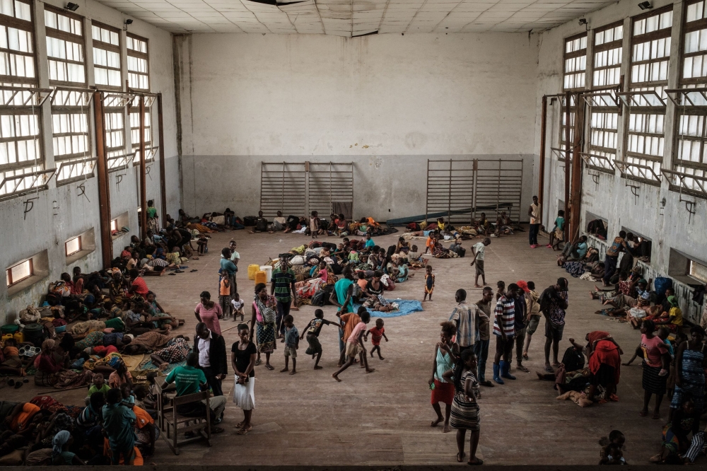 People of Buzi take shelter in the Samora M Machel secondary school used as an evacuation center in Beira Mozambique on March 21, 2019 following the Cyclone Idai. AFP/Yasuyoshi Chiba