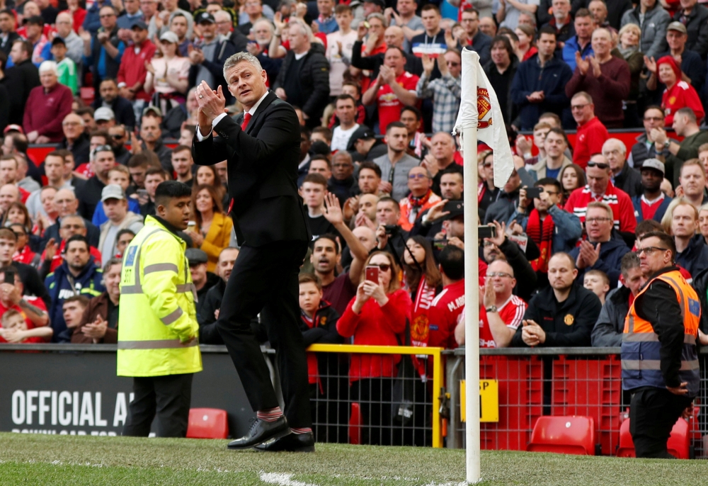 Manchester United interim manager Ole Gunnar Solskjaer applauds the fans Action Images via Reuters/Lee Smith 