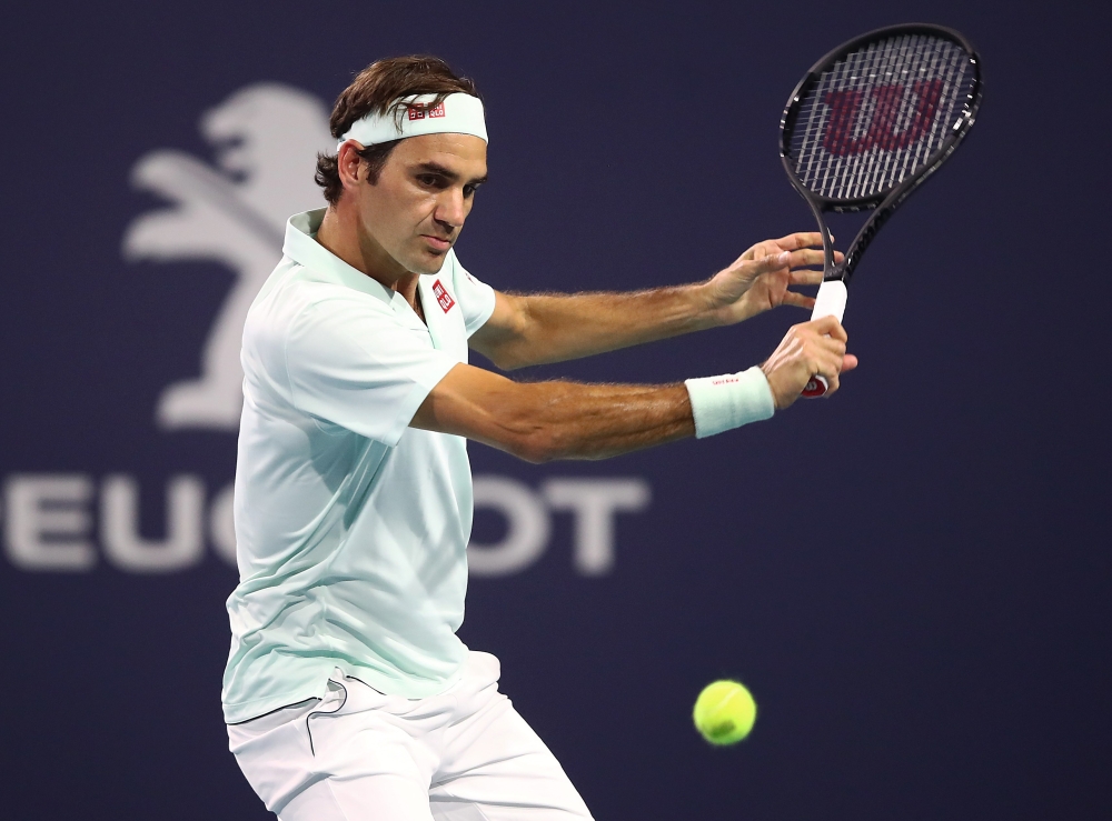 File photo of Roger Federer of Switzerland in action against Kevin Anderson of South Africa during day eleven of the Miami Open tennis on March 28, 2019 in Miami Gardens, Florida. Julian Finney/Getty Images/AFP